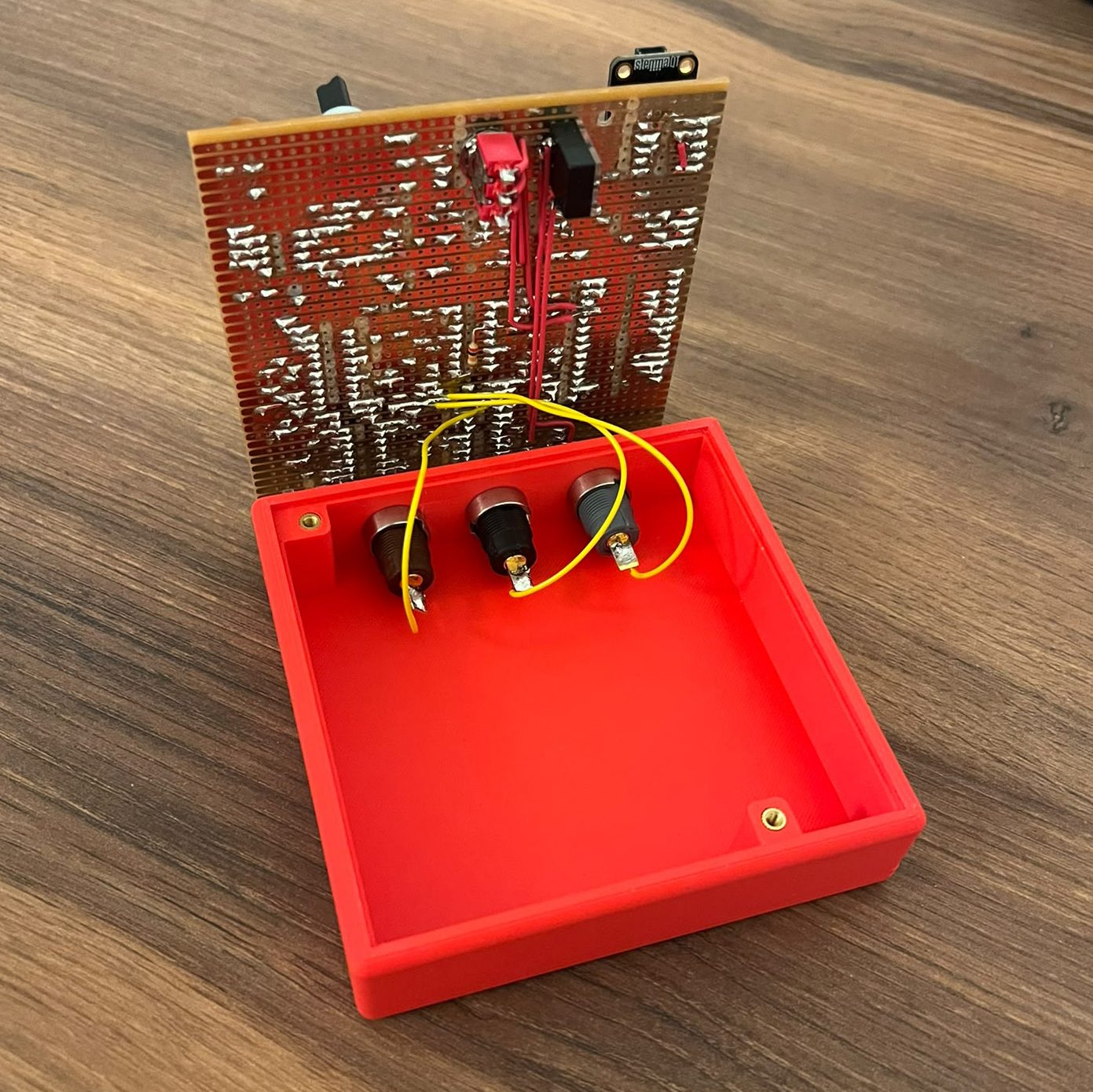 Inside, the jacks wired to the board.